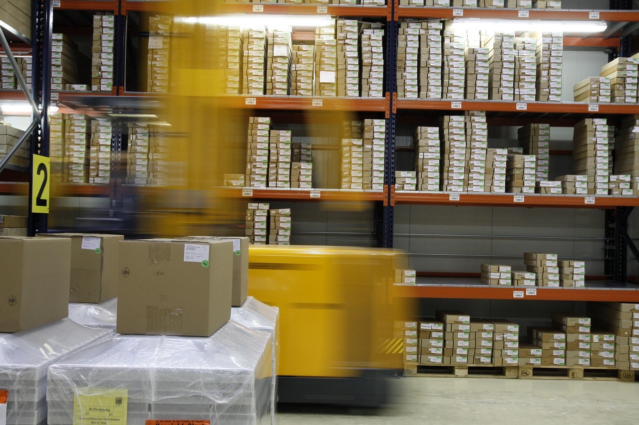 Warehouse shelves and cartons prepared for receiving and consolidation